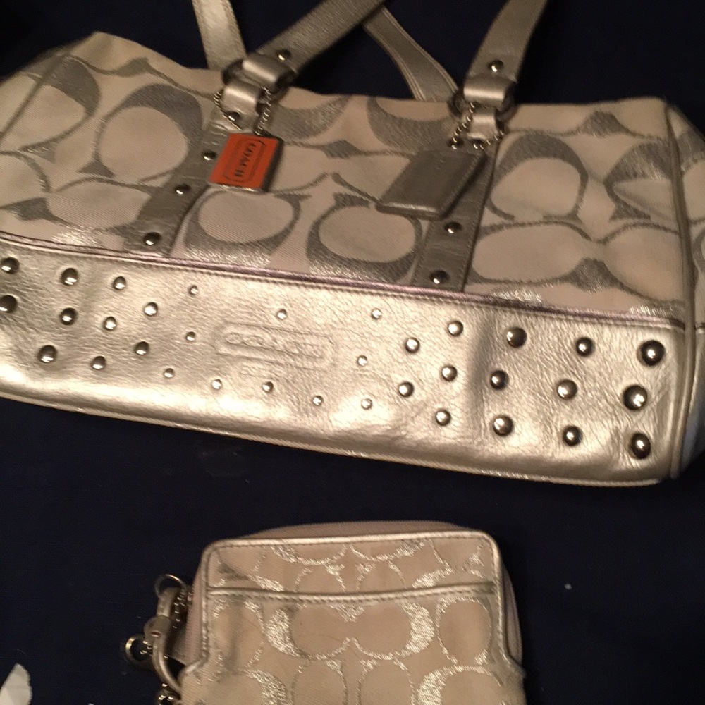Silver and gray Coach purse and wallet